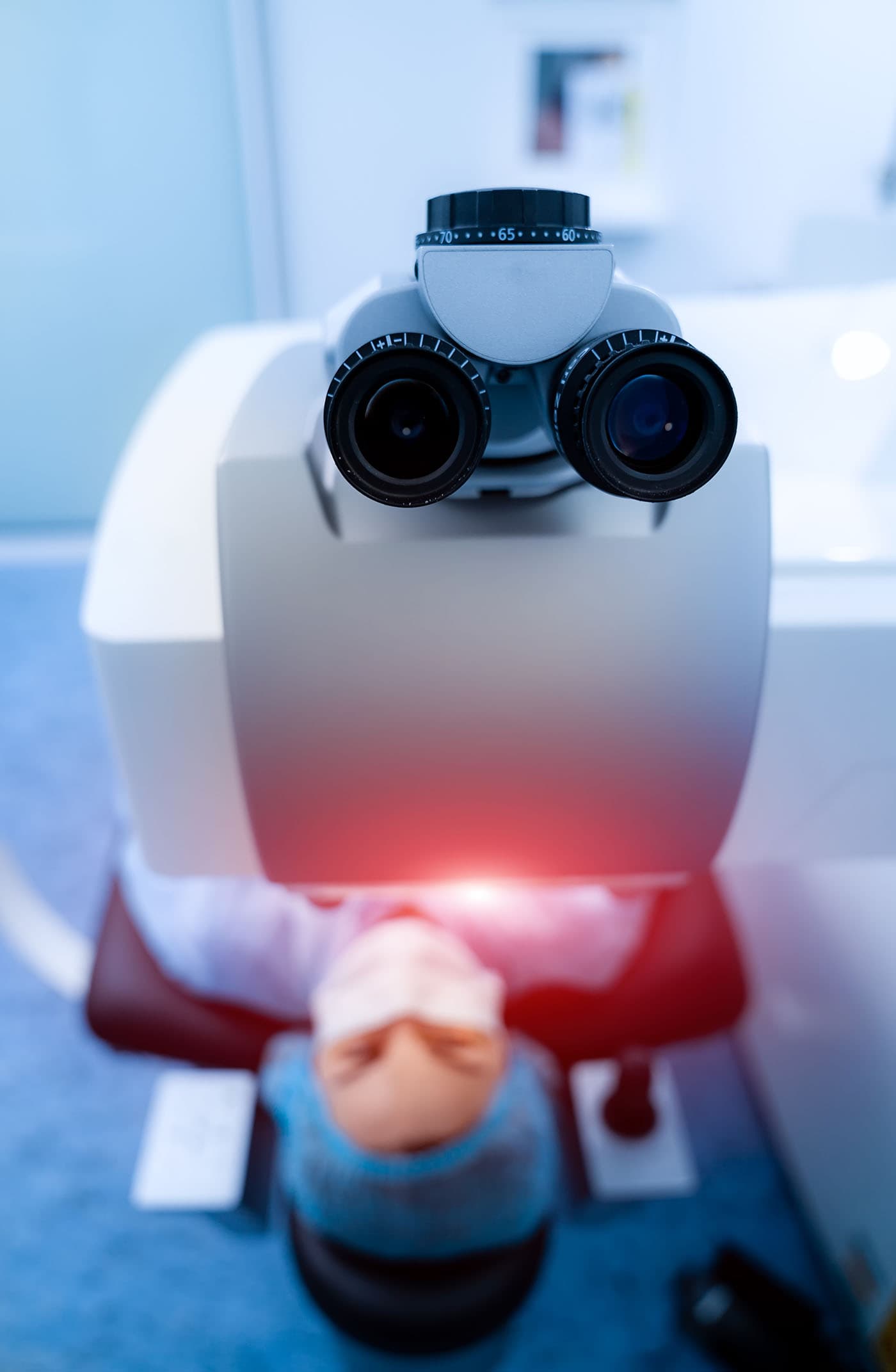 person laying down having an eye scan